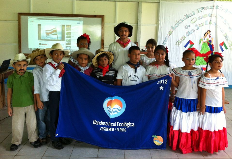 People holding Blue Flag Award